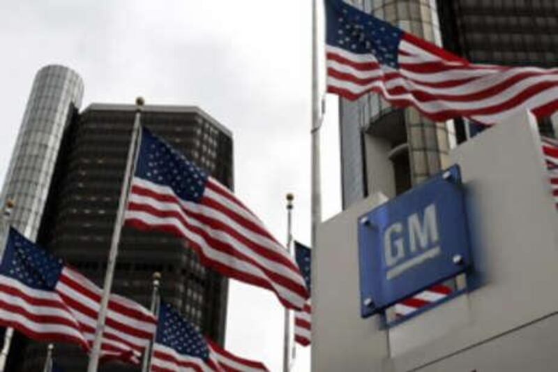 United States flags flutter in the wind in front of the GM headquarters in downtown Detroit, Michigan. The world's largest toy maker Mattel has surpassed a the struggling company in market value.
