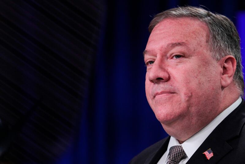 (FILES) In this file photo US Secretary of State Mike Pompeo speaks during a news conference at the State Department in Washington,DC on July 8, 2020. Secretary of State Mike Pompeo said July 13, 2020 that the United States would treat Beijing's pursuit of resources in the dispute-rife South China Sea to be illegal, ramping up pressure. "We are making clear: Beijing's claims to offshore resources across most of the South China Sea are completely unlawful, as is its campaign of bullying to control them," Pompeo said in a statement.
 / AFP / POOL / TOM BRENNER
