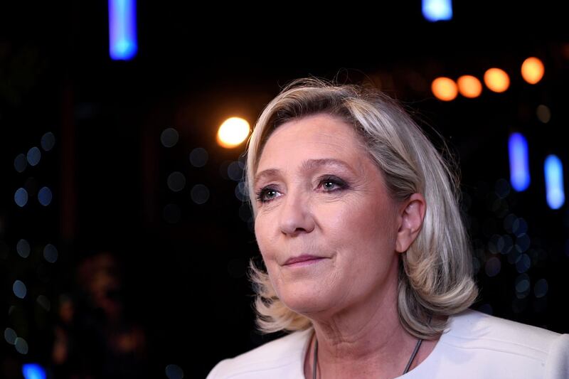 (FILES) In this file photo taken on May 26, 2019 French far-right Rassemblement National (RN) President and member of Parliament Marine Le Pen speaks to the press after the announcement of initial results during an RN election-night event for European parliamentary elections at La Palmeraie venue in Paris.
 A judiciary source said to AFP on June 12, 2019 that Marine Le Pen will appear before a criminal court concerning the pictures of Islamic State group's acts of violence that she published on Twitter in December 2015. / AFP / Bertrand GUAY
