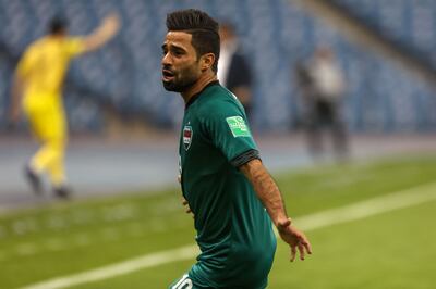 Iraq forward Hussein al-Saedi celebrates his goal. AFP
