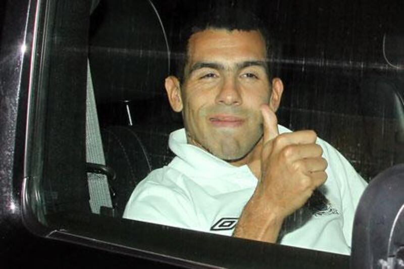 Carlos Tevez, the Manchester City forward, was given a police escort from Manchester airport following the team’s return from Germany in the early hours of yesterday morning after their 2-0 Champions League defeat to Bayern Munich.