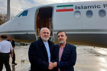 A photo posted on Twitter by Iran's Foreign Minister Mohammad Javad Zarif, left, shows him with Iranian scientist Massoud Soleimani prior to leaving Zurich, Switzerland for Tehran on December 7, 2019. via AP