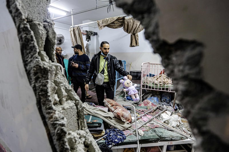 Palestinians inspect the damage in a maternity ward at Nasser hospital in Khan Younis on Sunday. AFP