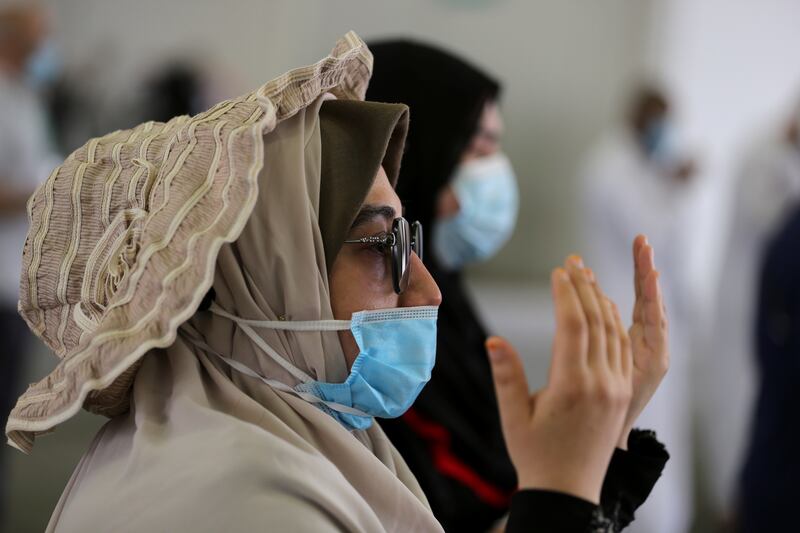 Pilgrims pray after the stone-throwing ritual in Mina, Saudi Arabia.