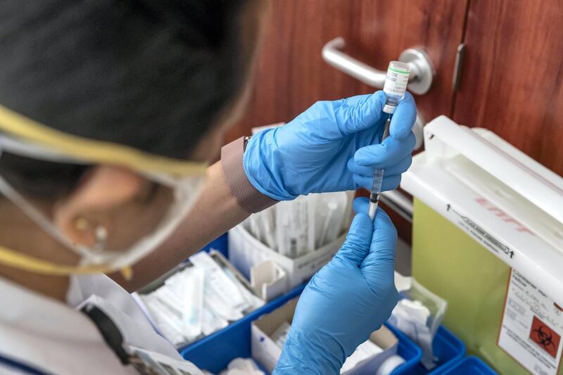 Covid-19 inoculations start in Dubai for Chinese nationals on visit visas to the UAE at the Al Safa Health Centre in Dubai on May 27th, 2021. Chinese National Chen Gang gets his shot.
Antonie Robertson / The National.
Reporter: Ramola Talwar for National.