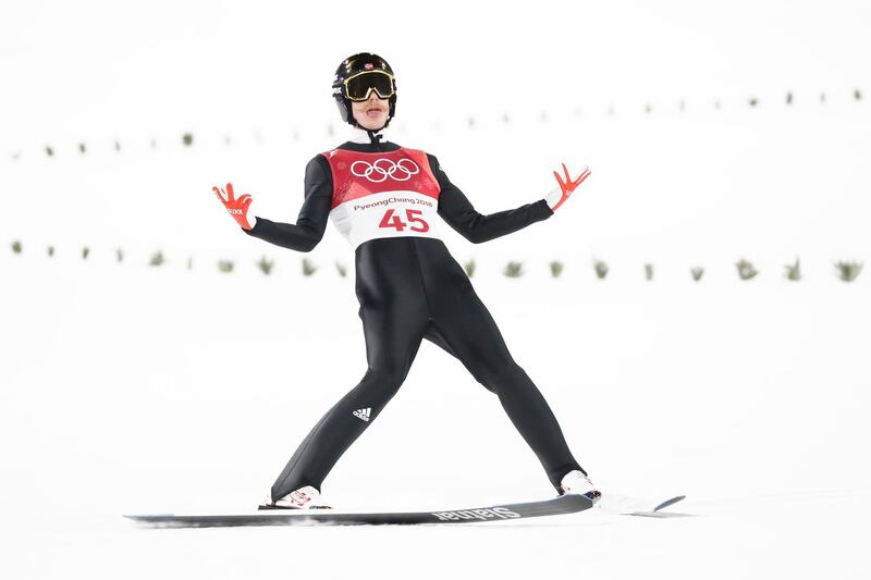 TOPSHOT - Norway's Robert Johansson reacts after competing in the men's normal hill individual ski jumping event during the Pyeongchang 2018 Winter Olympic Games on February 10, 2018, in Pyeongchang. / AFP PHOTO / Odd ANDERSEN