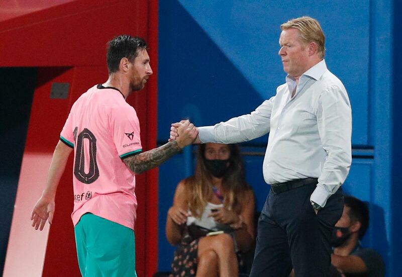 Soccer Football - Pre Season Friendly - FC Barcelona v Girona - Johan Cruyff Stadium, Barcelona, Spain - September 16, 2020 Barcelona's Lionel Messi shakes hands with coach Ronald Koeman as he is substituted off REUTERS/Albert Gea