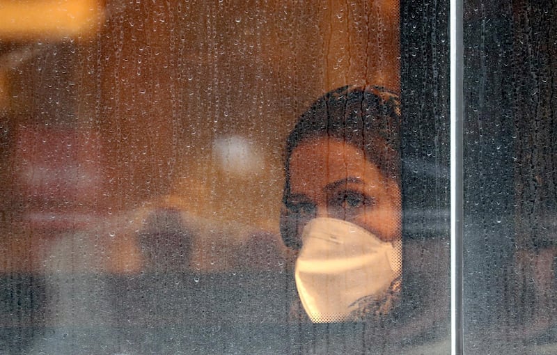 An Iranian woman wearing face mask sits in a bus on a street of Tehran, Iran According to the Ministry of Health, 139 people diagnosed with the Covid-19 coronavirus.  EPA