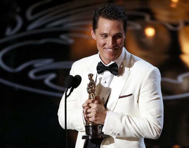 Matthew McConaughey accepts his Oscar for best actor for his role in Dallas Buyers Club. Lucy Nicholson / Reuters