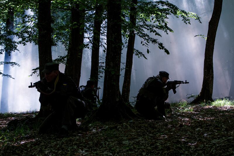 Ukrainian National Guard soldiers train in the woods of the Transcarpathian region. Reuters
