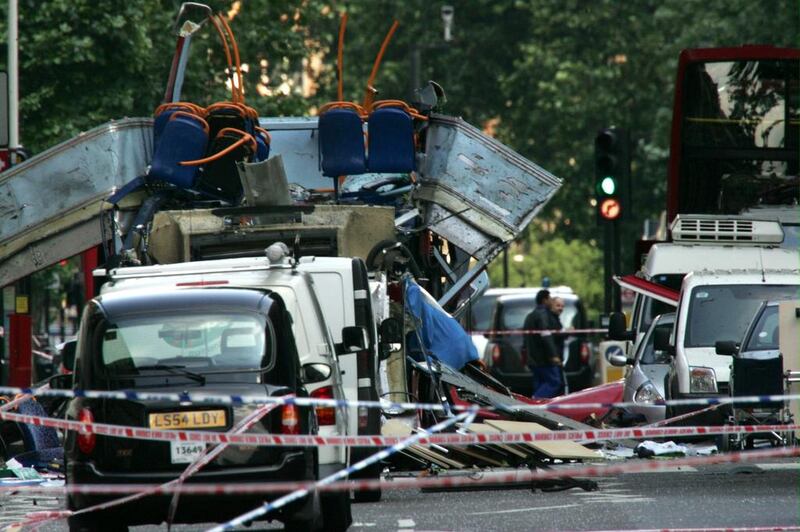 The wreckage of a double-decker bus with its top blown off at Tavistock Square in central London in the July 7, 2005 terror attacks. The UK security services have undergone a major overhaul since then. AP Photo/Sang Tan, File