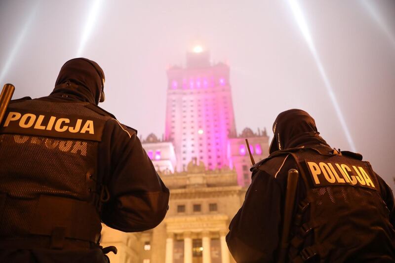 Police patrol in front of the Palace of Culture and Science in Warsaw, Poland. EPA