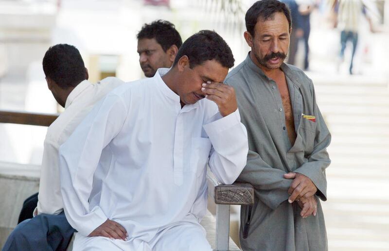 Residents in Abu Dhabi’s old market mourn the death of Sheikh Zayed. Reuters