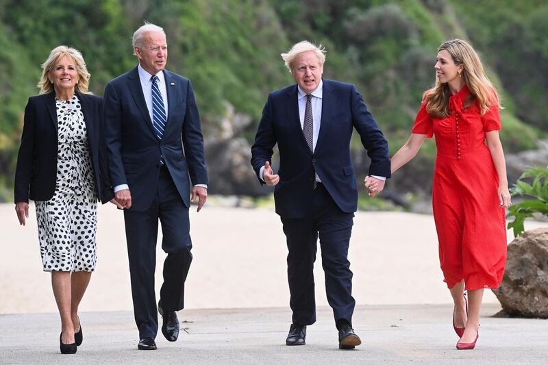 Britain's Prime Minister Boris Johnson, his wife Carrie Johnson and U.S. President Joe Biden with first lady Jill Biden walk outside Carbis Bay Hotel, Carbis Bay, Cornwall, Britain June 10, 2021. REUTERS/Toby Melville/Pool