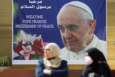 A poster of Pope Francis in Baghdad before his visit to Iraq. Reuters