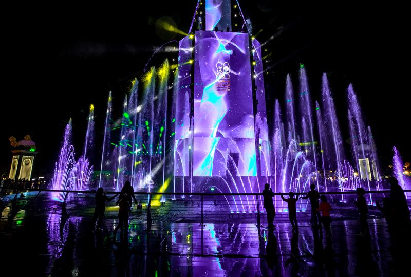 Visitors enjoy the evening at the Sheikh Zayed Heritage Festival