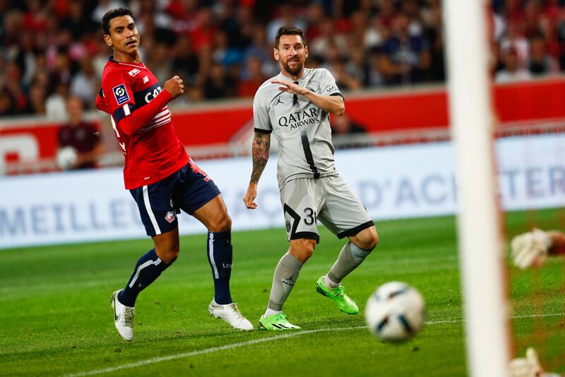 Paris Saint-Germain's Lionel Messi sees a shot towards the Lille goal. EPA 