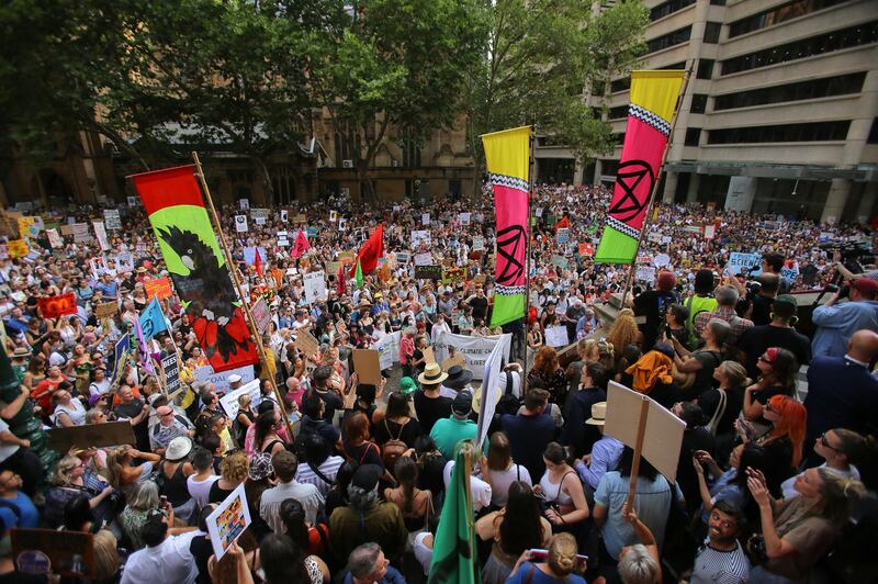 Protesters take part in a climate change rally under the slogan 'Sack ScoMo!' in Sydney, New South Wales, Australia. EPA