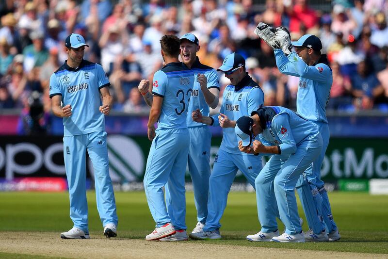 CHESTER-LE-STREET, ENGLAND - JULY 03:  Mark Wood of England celebrates with the team as he runs out Kane Williamson of New Zealand during the Group Stage match of the ICC Cricket World Cup 2019 between England and New Zealand at Emirates Riverside on July 03, 2019 in Chester-le-Street, England. (Photo by Clive Mason/Getty Images)