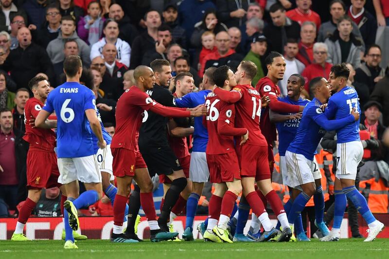 Liverpool and Leicester players scuffle at the final whistle. AFP