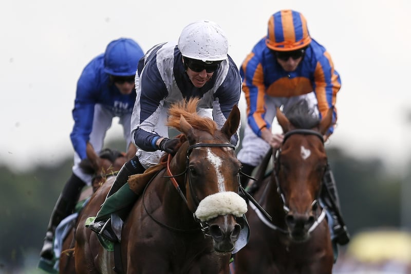 YORK, ENGLAND - AUGUST 23:  Jim Crowley riding Ulysses (C, white cap) win The Juddmonte International Stakes from Churchill (R) at York racecourse on August 23, 2017 in York, England. (Photo by Alan Crowhurst/Getty Images)