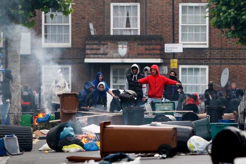 Rioters construct barricades on Goulton Road in Hackney.