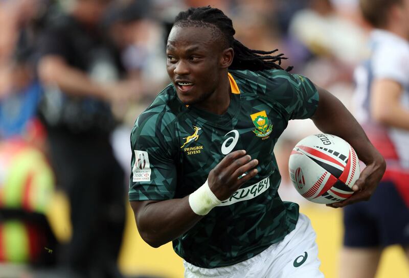 South Africa's Saebelo Senatla runs in a try during the World Rugby Sevens Series match between South Africa and Russia at Waikato Stadium in Hamilton on February 3, 2018. (Photo by MICHAEL BRADLEY / AFP)