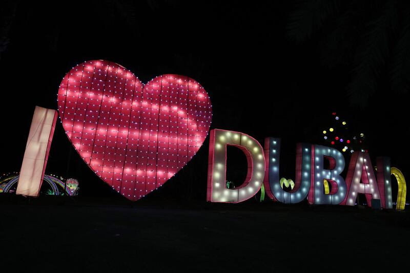 DUBAI, UNITED ARAB EMIRATES , October 14 – 2020 :- View of the colourful light figures at the Dubai Garden Glow season 6 which opened on 12th October at the Zabeel park in Dubai. No sitting allowed on the benches as a precautionary measure against the spread of coronavirus. Security at the entrance gate checks the body temperature of all the visitors. (Pawan Singh / The National) For Life Style/Online/Instagram/Big Picture. Story by Evelyn Lau