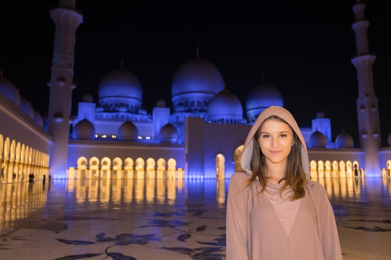 Lexie Alford at Sheikh Zayed Grand Mosque in Abu Dhabi during her mission to visit every country in the world. Courtesy lexielimitless.com