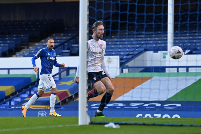 Cenk Tosun watches his shot hit the back of the net to put Everton in front.