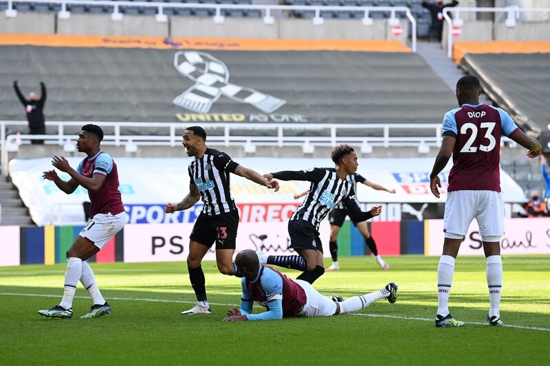 Joe Willock of Newcastle United celebrates after scoring his team's third goal against West Ham United at St James' Park. Getty