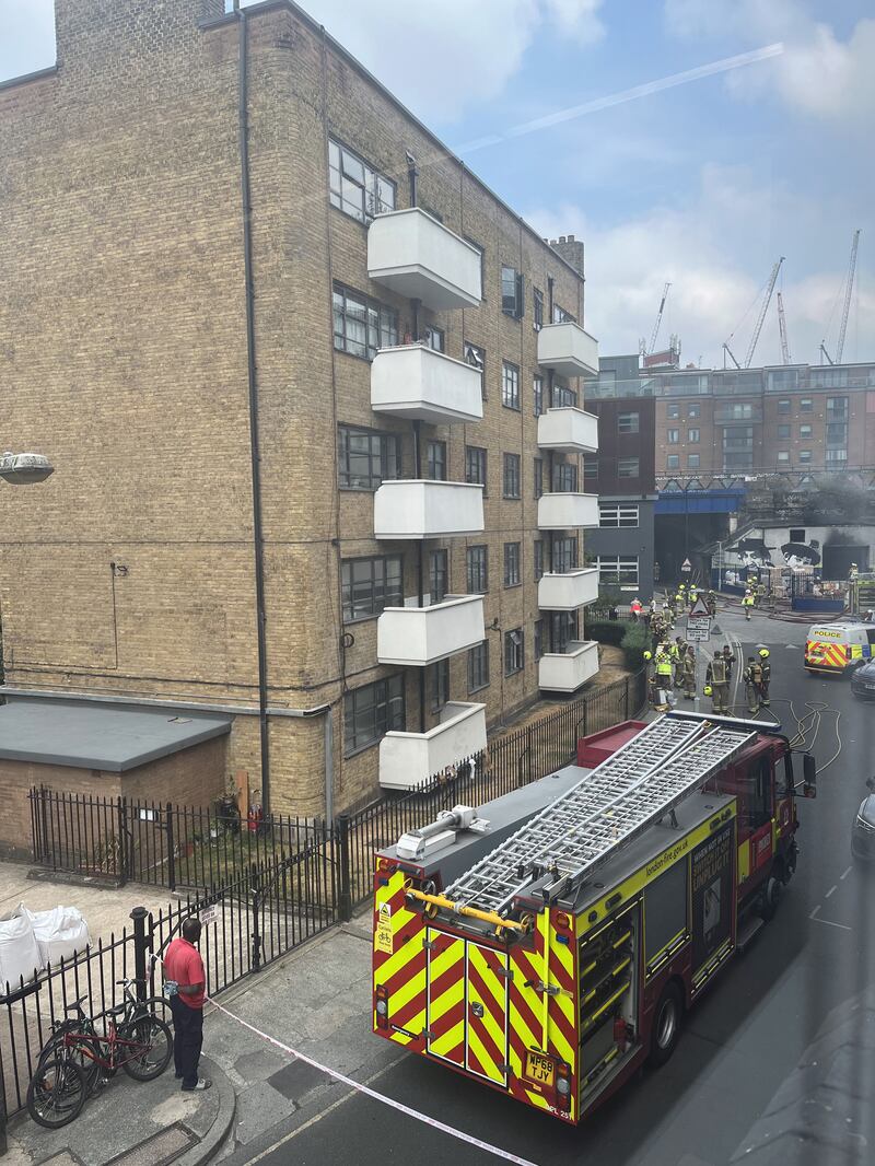 Rail services have been disrupted and buildings evacuated due to the fire. PA