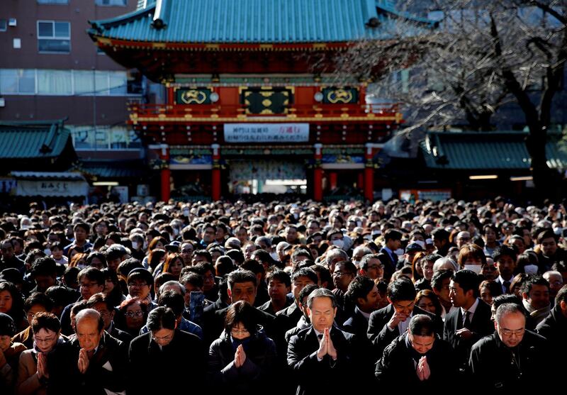 People offer prayers on the first business day of the year at the Kanda Myojin shrine, which is known to be frequented by worshippers seeking good luck and prosperous business, in Tokyo, Japan. Reuters