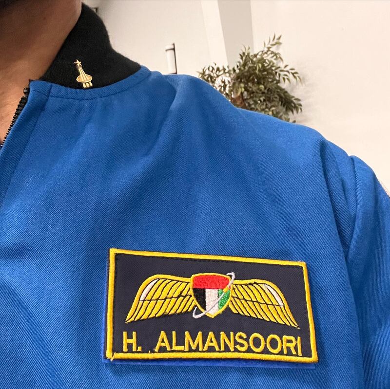 Maj Al Mansouri received the gold Nasa astronaut pin because he has already flown to space.