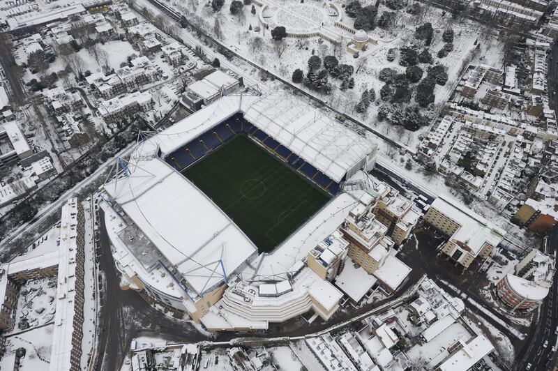 A snow-covered Stamford Bridge after the Premier League game between Chelsea and Manchester United had been postponed in December, 2010. Shutterstock