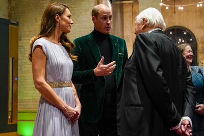 Prince William and Kate talk with broadcaster David Attenborough as they attend the first ever Earthshot Awards ceremony in London. AP