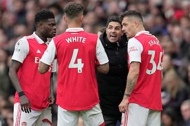 Arsenal's manager Mikel Arteta, second right, speaks to his players during the English Premier League soccer match between Arsenal and Leeds United at the Emirates Stadium in London, Saturday, April 1, 2023. (AP Photo / Kin Cheung)