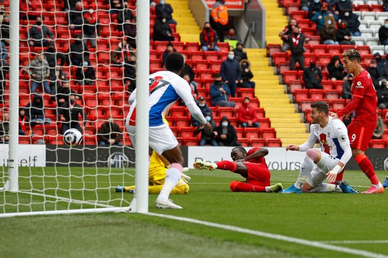 Liverpool striker Sadio Mane scores the opening goal. AFP