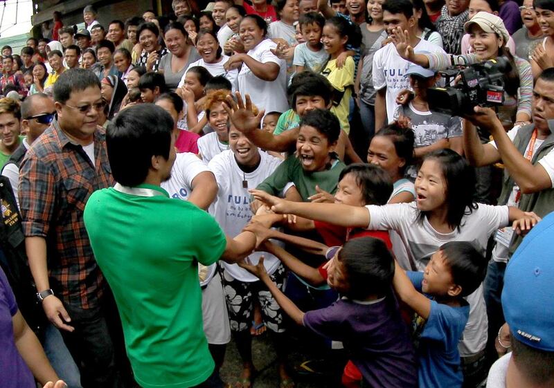 Manny Pacquiao greets fans in General Santos last year after a morning training session. Mike Young for The National / October 6, 2014