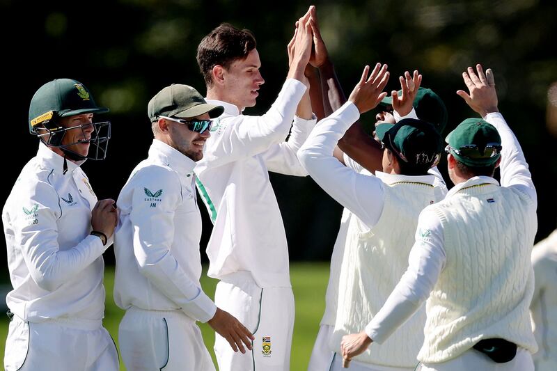 South Africa's Marco Jansen, centre, celebrates the wicket of New Zealand's Will Young. AFP