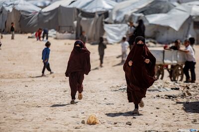 Children run in Al Hol camp in Hasakeh province, Syria. April 19, 2023.  AP 
