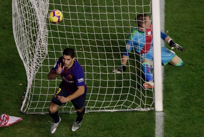 Barcelona's Luis Suarez celebrates after scoring. AP Photo