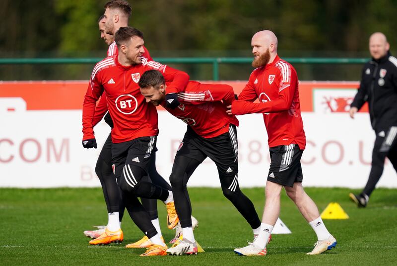 Wales' Aaron Ramsey, Chris Gunter and Jonny Williams during training. PA