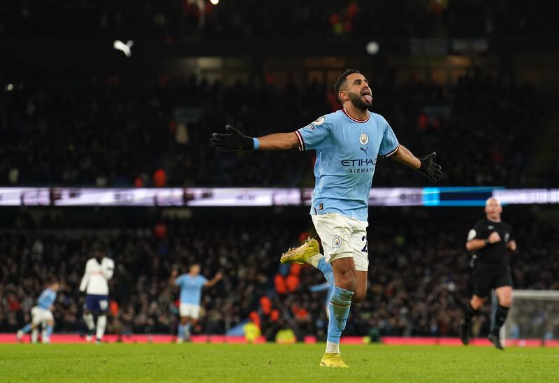 Riyad Mahrez celebrates scoring City's fourth goal. PA