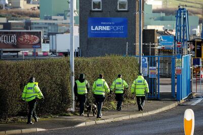 FILE PHOTO: Police officers carry out a security sweep near the Port of Larne, Northern Ireland, Britain January 1, 2021. REUTERS/Phil Noble/File Photo