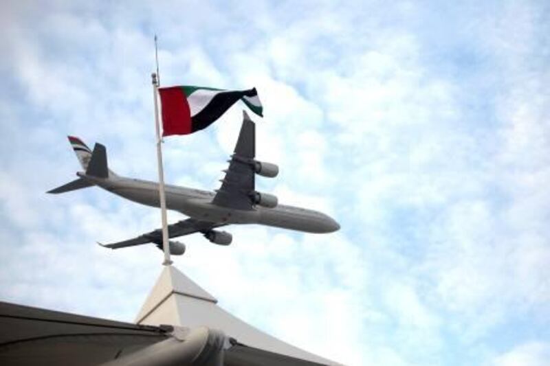 United Arab Emirates - Abu Dhabi - November 10th, 2010:  An Etihad Aeroplane practices a flyover at Yas Circuit that will be preformed on race day.  (Galen Clarke/The National)