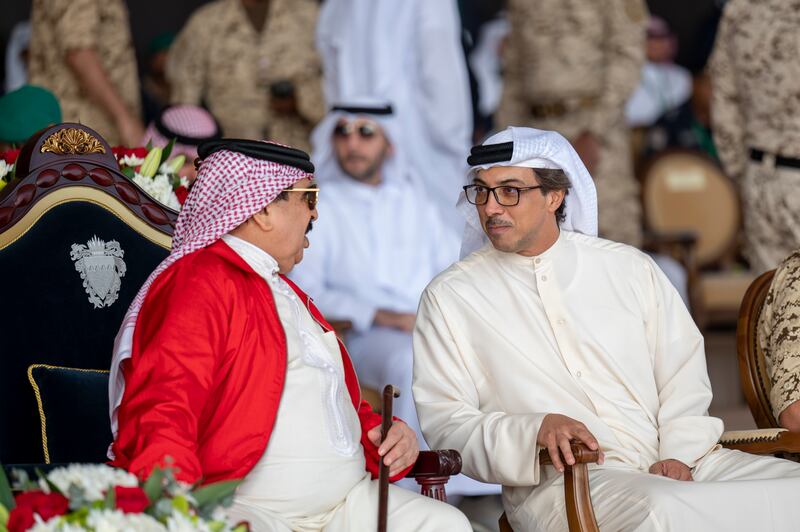 Sheikh Mansour speaks with King Hamad.
