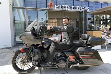 Emirati Yousuf Alrustamani, owner of Mitts & Trays restaurants, enjoys spending money on travelling to Harley Davidson events around the world. Pawan Singh / The National