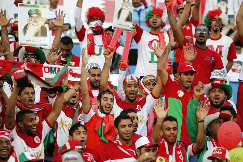 Omani fans cheer for their team prior to the start of the Gulf Cup of Nations Group B match. AFP