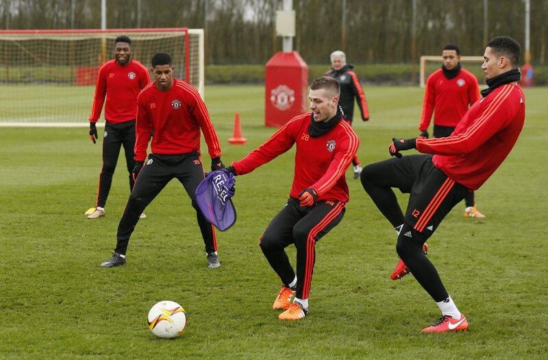 Manchester United’s Marcus Rashford, Morgan Schneiderlin and Chris Smalling during training. Action Images via Reuters / Jason Cairnduff